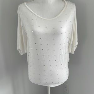 Women’s embellished white top